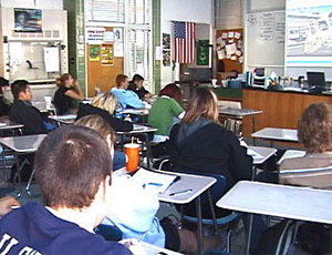 Students watching live video remotely